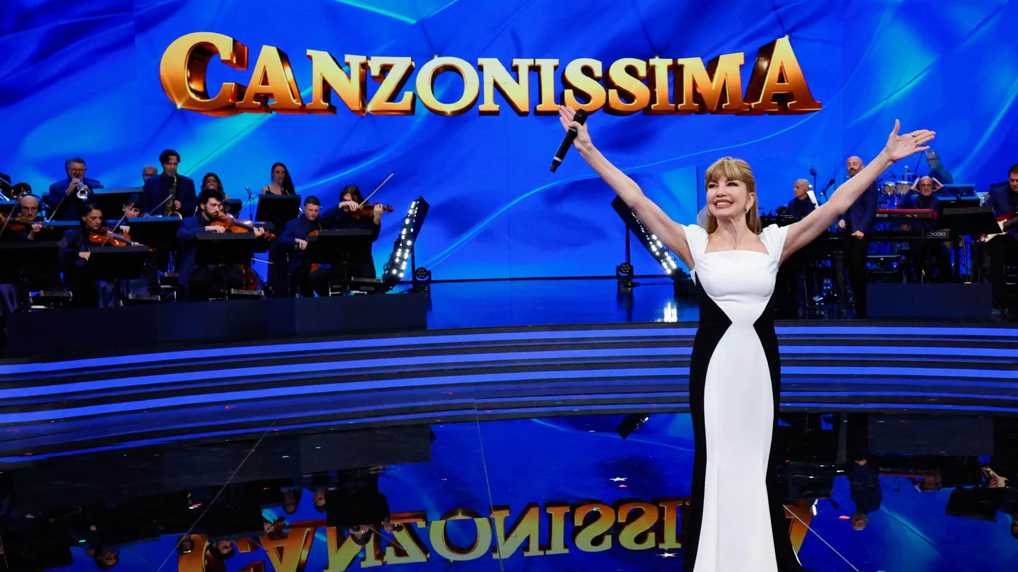 CANZONISSIMA: BUONA LA PRIMA PER MILLY CARLUCCI. LA GIOIA RAI E QUEI PICCHI CANZONISSIMA: BUONA LA PRIMA PER MILLY CARLUCCI. LA GIOIA RAI E QUEI PICCHI